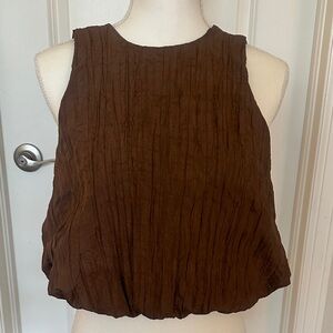 Women’s bubble hem sleeveless top